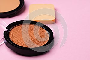 Cosmetics for face complexion on pink background