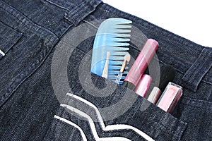 Cosmetics in jeans pocket