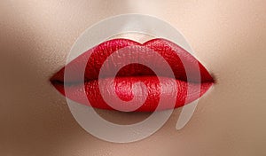 Cosmetics, makeup. Bright lipstick on lips. Closeup of beautiful