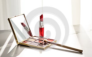 Cosmetics, makeup products set on marble vanity table, lipstick, eyeshadows and make-up brush for luxury beauty and fashion brand