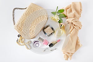 Cosmetics, perfumes, jewelry made of pearls and handbag