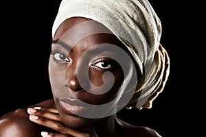 Cosmetics, portrait and black woman with head wrap, natural makeup or creative aesthetic in studio. Art, skincare and