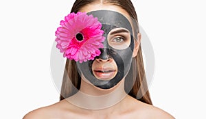The cosmetologist makes the procedure for cleansing the skin from acne to a beautiful brown-eyed girl in a beauty salon. Hardware