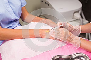 Cosmetology and beauty concept - Anti-age injection therapy, hand rejuvenation