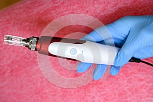 Cosmetology device for dermapen mesotherapy close-up. photo