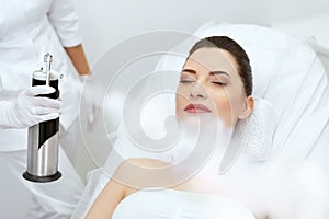 Cosmetology. Woman At Facial Oxygen Cryotherapy At Beauty Centre