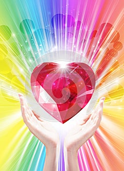 Cosmic love, universal diamond heart in hands with spark of hope, the light of faith, spiritual release