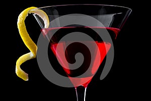 Cosmopolitan cocktail on black background
