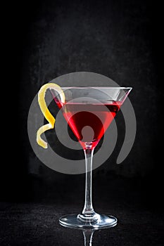 Cosmopolitan cocktail on black background