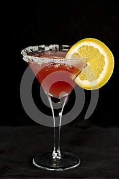 Cosmopolitan Cocktail with cranberry juice, vodka, lime juice and cointreau