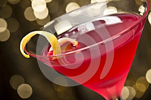 Cosmopolitan cocktail with lemon garnish