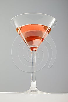 Cosmopolitan cocktail martini glass studio photo. Fashion cocktails.