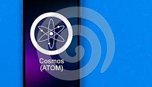 Cosmos ATOM symbol. Trade with cryptocurrency, digital and virtual money, banking with mobile phone concept. Business