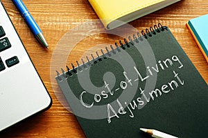 Cost-of-Living Adjustment COLA is shown on the conceptual business photo photo