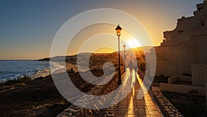 Costa Calma beach resort illuminated at sunset in the summertime photo