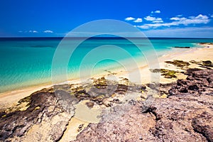 Costa Calma sandy beach with vulcanic mountains in the background, Jandia, Fuerteventura island, Canary Islands, Spain.