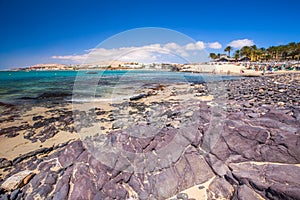 Costa Calma sandy beach with vulcanic mountains in the background, Jandia, Fuerteventura island, Canary Islands, Spain.