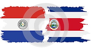 Costa Rica and Paraguay grunge flags connection vector