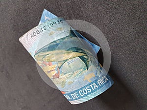 Costa Rican banknote of 2000 colones and black background