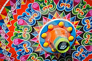 Costa Rican typical oxcart wheel whit painted colorful wheel photo