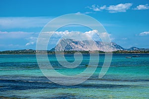 Costa Smeralda coast of Tyrrhenian Sea and Isola Tavolara island seen from San Teodoro resort town in Sardinia,