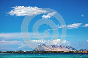 Costa Smeralda coast of Tyrrhenian Sea and Isola Tavolara island seen from San Teodoro resort town in Sardinia,