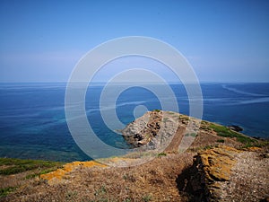 Rocky coast near the sea of Sardinia, Torre dei Corsari photo