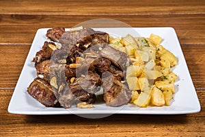 Costillas al ajillo photo