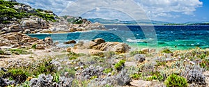 Costline of Costa Serena with sandstone rocks and sea waves, Sardinia, Italy