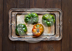 Costoluto tomatoes on a metal tray