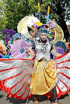 Costume parade participants while preparing to perform