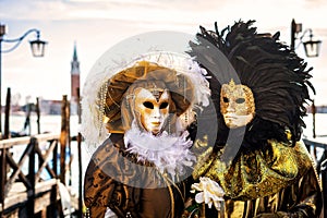 Costume reveller poses during the Carnival in Venice, Italy.