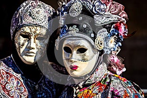 Costume reveller poses during the Carnival in Venice, Italy.