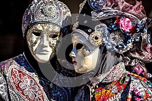 Costume reveller poses during the Carnival in Venice, Italy.