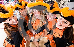 Costumed girls with tricorns from carnival club during Carnival photo