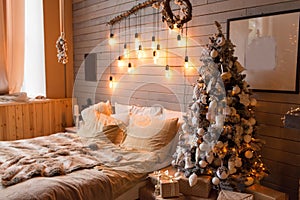 Cosy bedroom with eco decor. Wood and nature concept in interior of room. Scandinavian interior with christmas tree, real photo. H