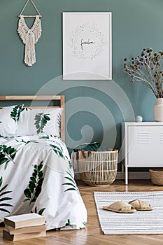 Cosy bedroom interior with natural boho accessories.