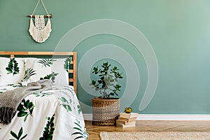 Cosy bedroom interior with natural boho accessories.