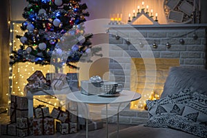 Cosy interior with a fireplace decorated in Christmas style