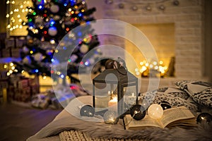 Cosy interior with a fireplace decorated in Christmas style