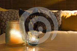 Cosy room interior inside a family home living room with candle light