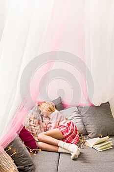 Cosy sleeping area with canopy