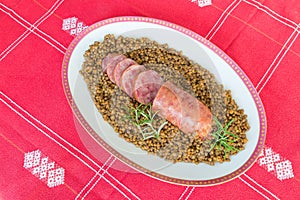 Cotechino pork sausage with lentils. Traditional Italian dish
