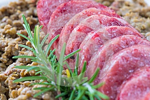 Cotechino - pork sausage, with lentils. Traditional Italian food photo