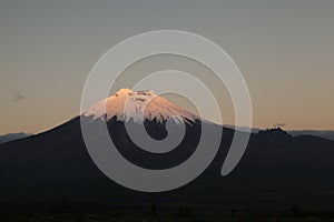 Cotopaxi and Morurco at sunset photo
