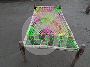 This is a Cots. It is a colourful cots