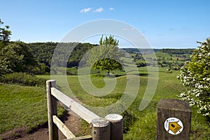 Cotswold Way long distance footpath passes the toposcope on Coaley Peak