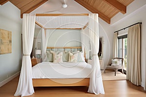 cottage bedroom with canopy bed and wooden ceiling