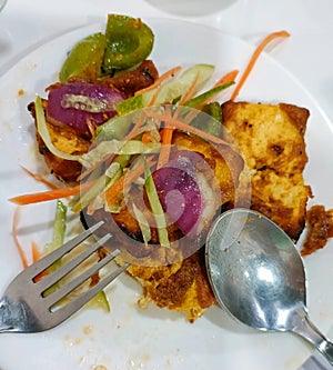 Cottage cheese based appetizer served in an Indian lunch