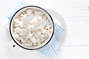 Cottage cheese, curd on white wooden rustic table